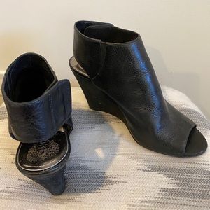 Open toe leather wedges.